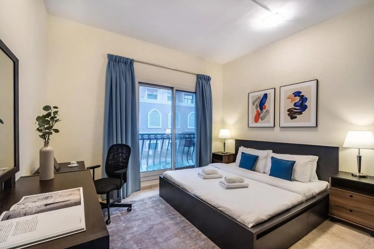 Spacious 1-Br Opposite Mall With Huge Pool & Gym Dubai Apartment