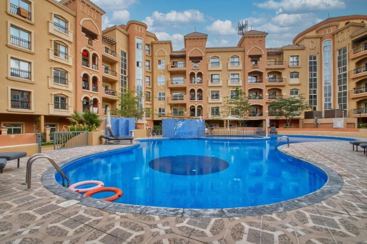 Spacious 1-Br Opposite Mall With Huge Pool & Gym Dubai Apartment